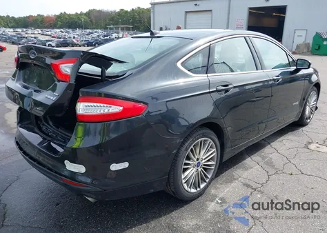 2014 Ford Fusion Hybrid Se z USA, uszkodzony, nr VIN 3FA6P0LU8ER238650